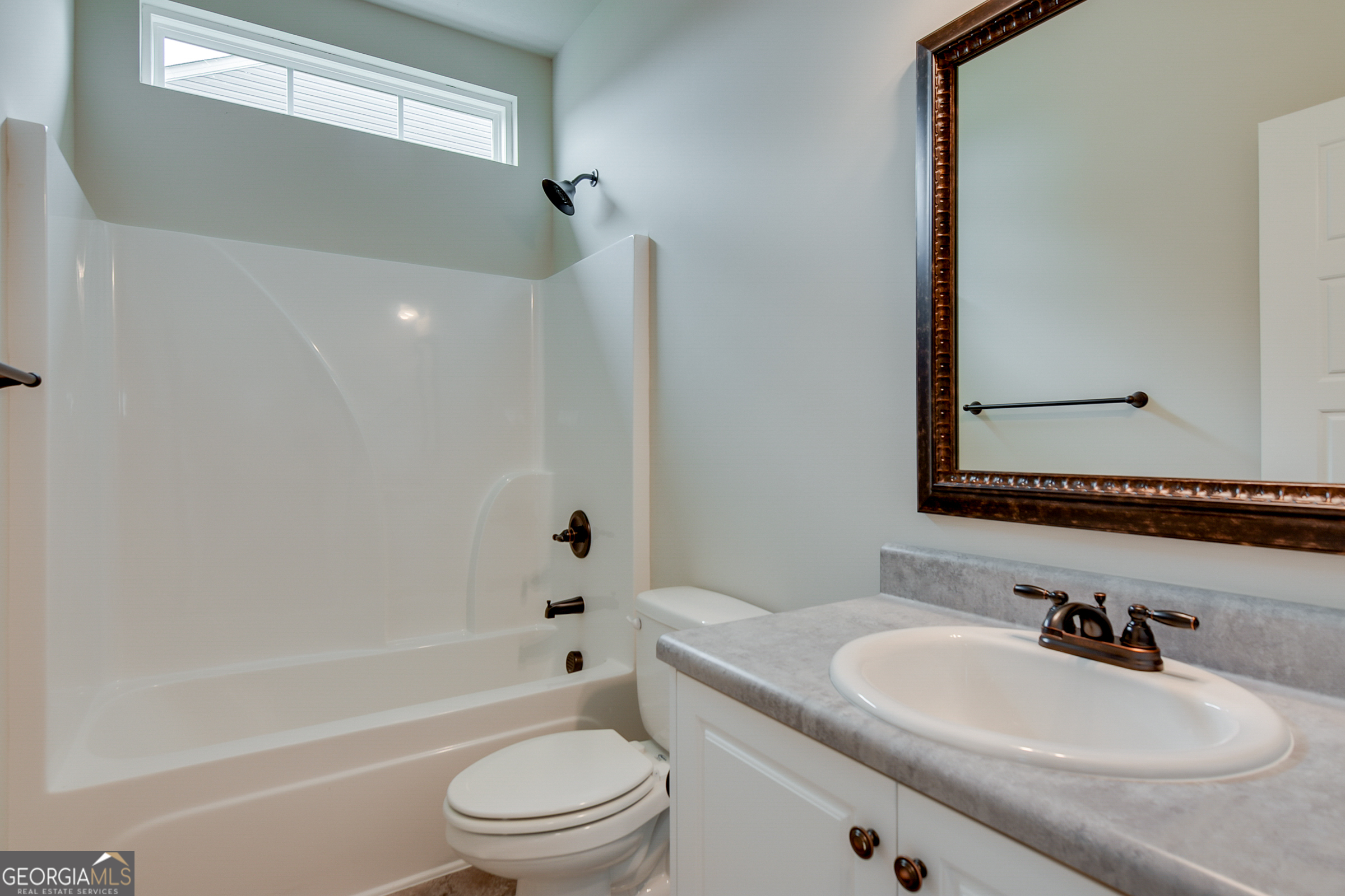 0 Orchard Circle Edgefield, SC 29824 - Photo 7 of 10 a bathroom with a toilet a sink and a bathtub