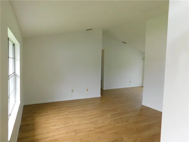 an empty room with a natural light