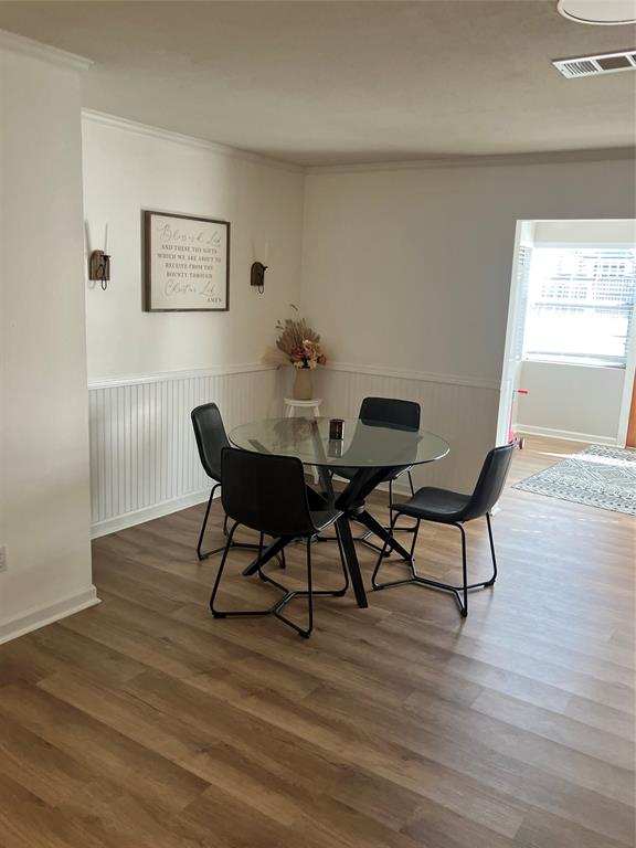 233 Church Road Stonewall, LA 71078 - Photo 24 of 32 a view of a dining room with furniture and wooden floor