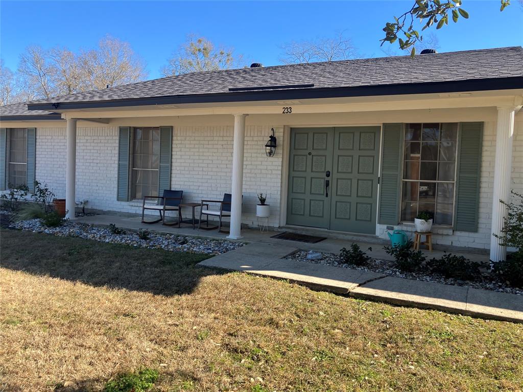 233 Church Road Stonewall, LA 71078 - Photo 5 of 32 a front view of a house with garden