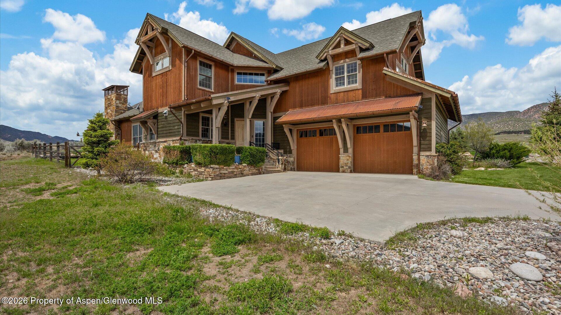 829 Ute Circle New Castle, CO 81647 - Photo 1 of 37 a front view of a house with a yard