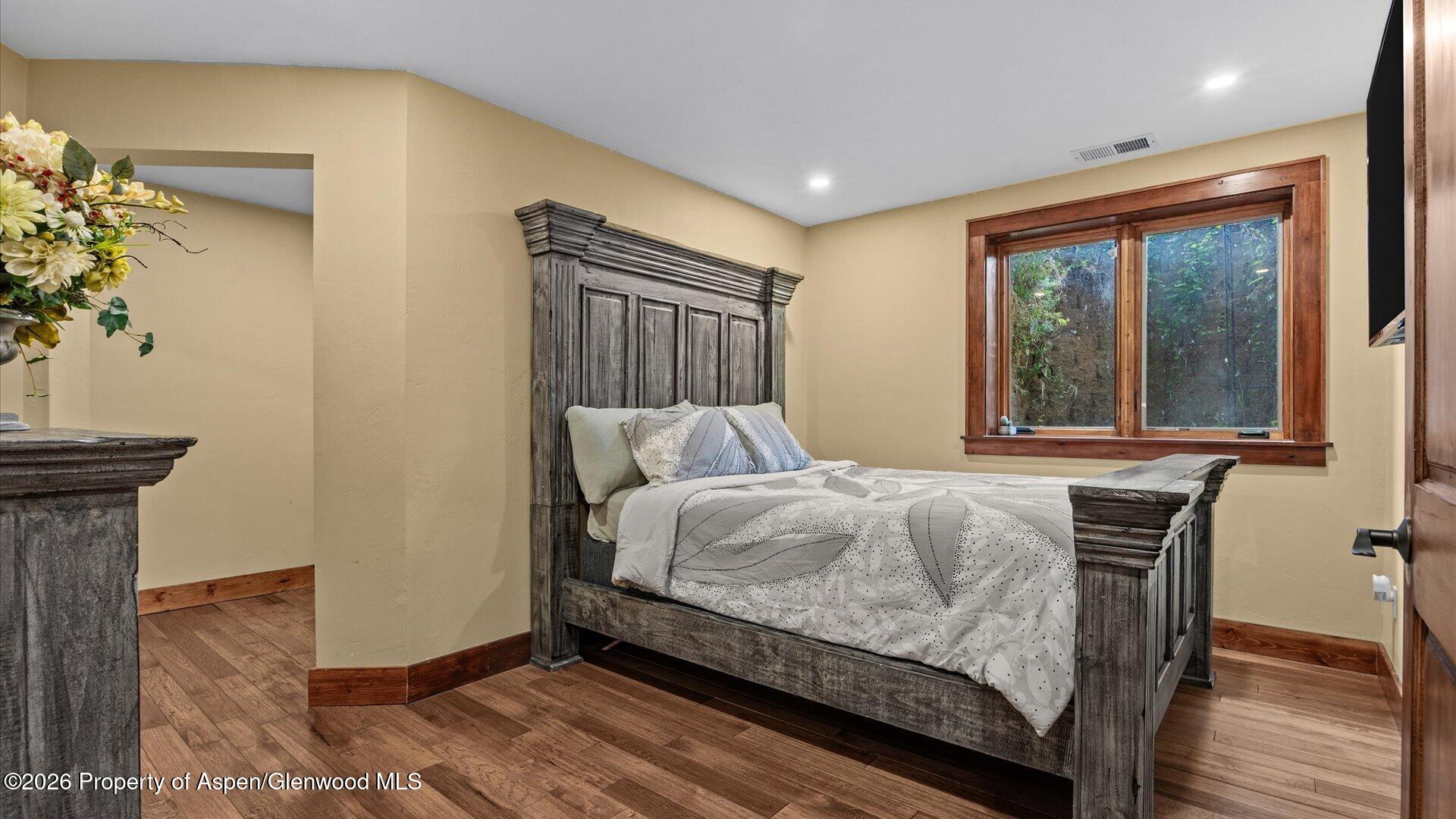 829 Ute Circle New Castle, CO 81647 - Photo 22 of 37 a bedroom with a bed and a window