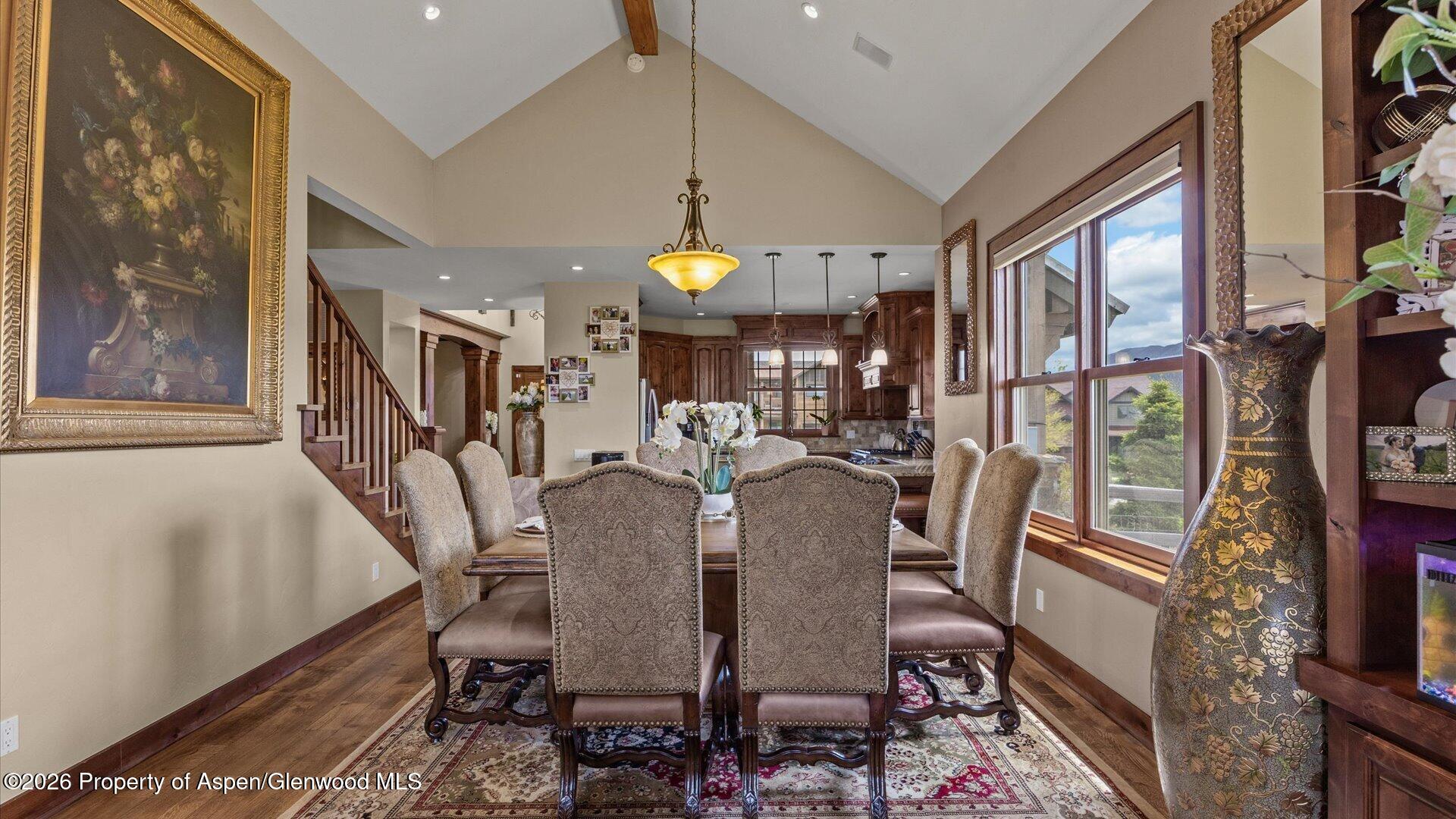 829 Ute Circle New Castle, CO 81647 - Photo 7 of 37 a view of a dining room with furniture window and wooden floor