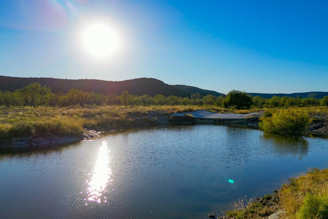 a view of lake with mountain