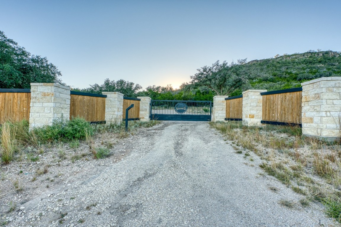 32901 Highway 55 Uvalde, TX 78801 - Photo 32 of 37 a backyard of a house with plants and trees