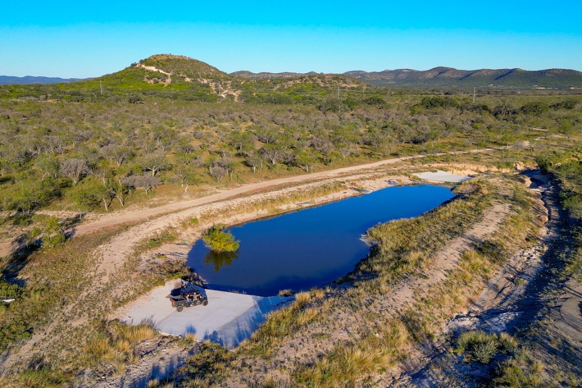 32901 Highway 55 Uvalde, TX 78801 - Photo 6 of 37 a view of a mountain from a yard