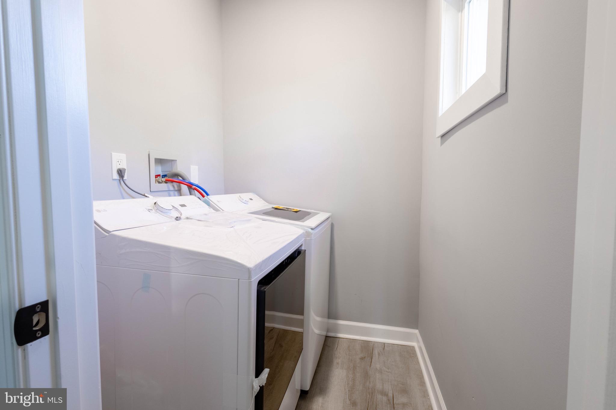 619 Aldershot Road Baltimore, MD 21229 - Photo 12 of 29 a utility room with dryer and washer