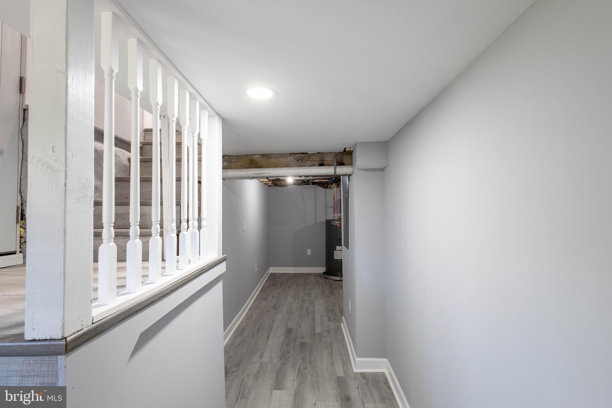 619 Aldershot Road Baltimore, MD 21229 - Photo 14 of 29 a view of entryway with wooden floor