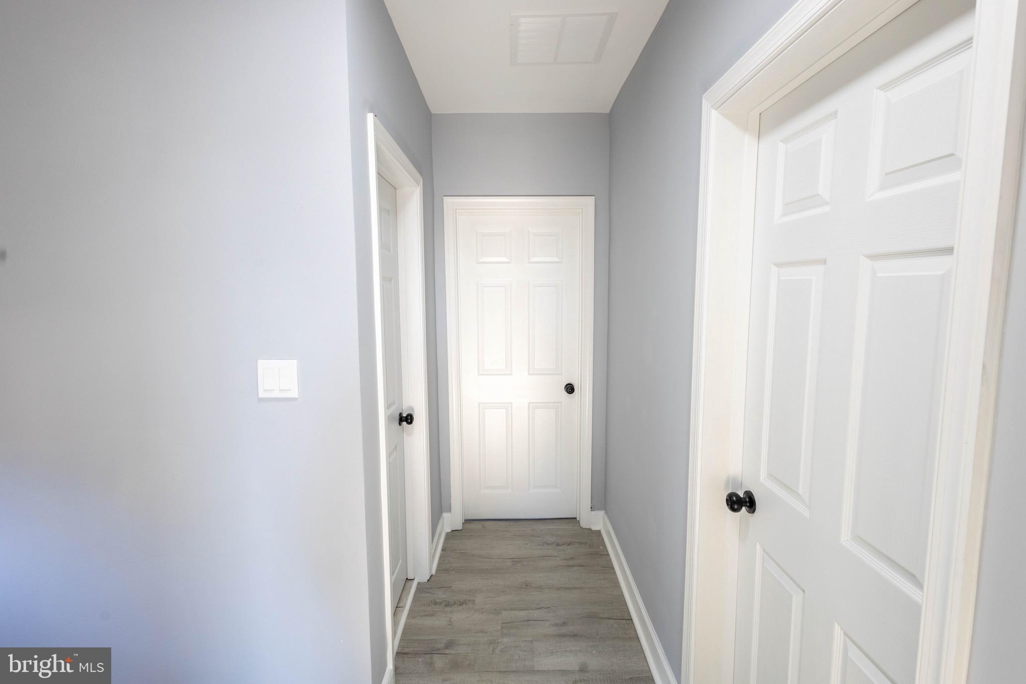 619 Aldershot Road Baltimore, MD 21229 - Photo 18 of 29 a view of a hallway with a hallway
