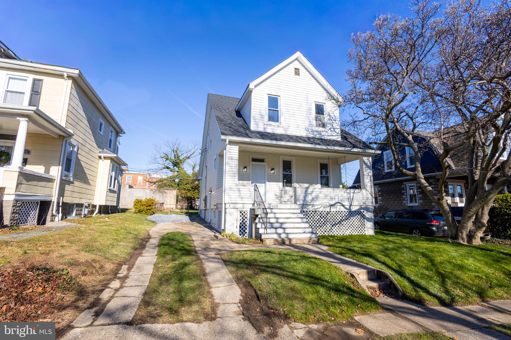619 Aldershot Road Baltimore, MD 21229 - Photo 2 of 29 a view of a house with a yard