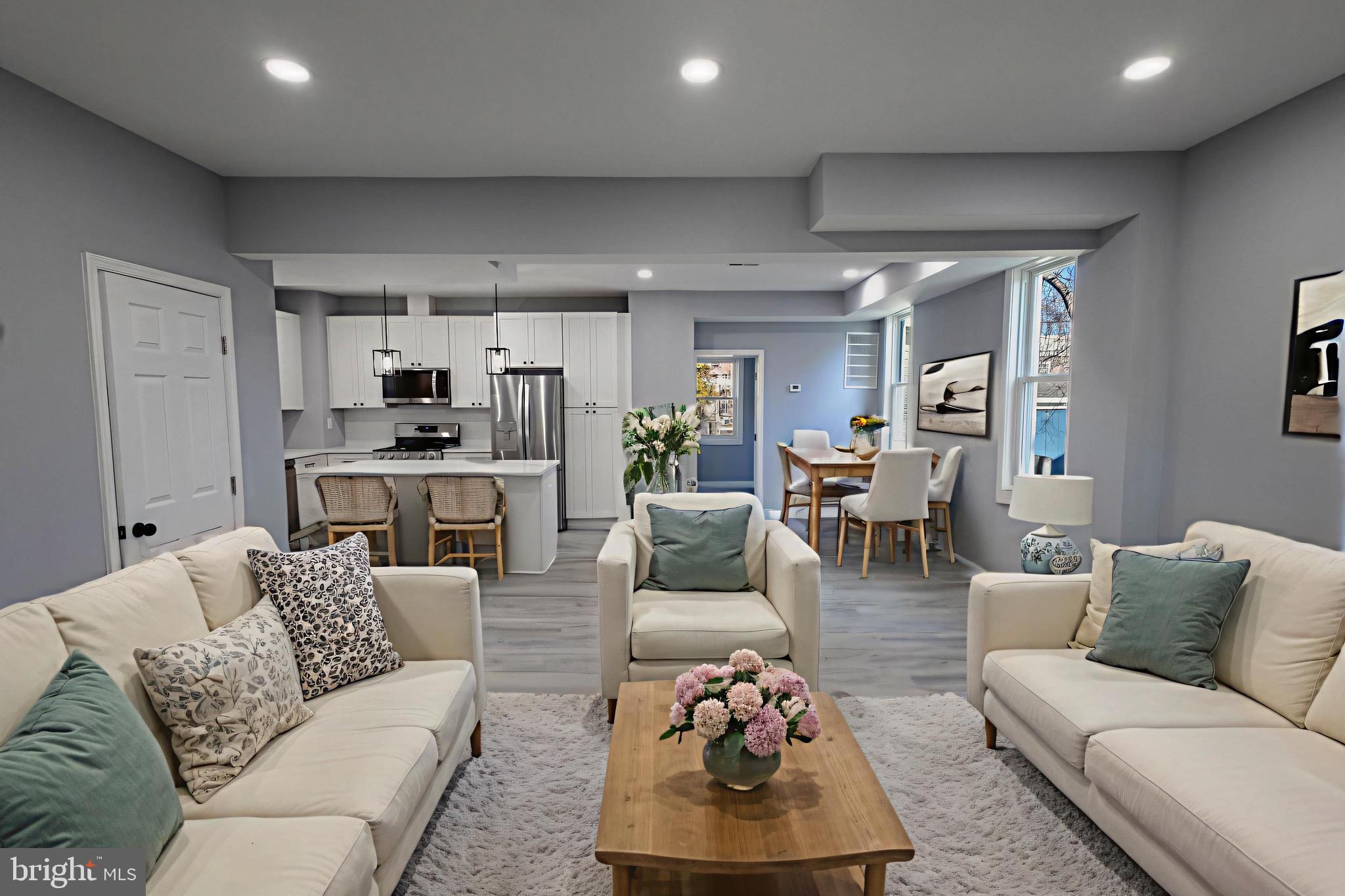 619 Aldershot Road Baltimore, MD 21229 - Photo 3 of 29 a living room with furniture and a view of kitchen