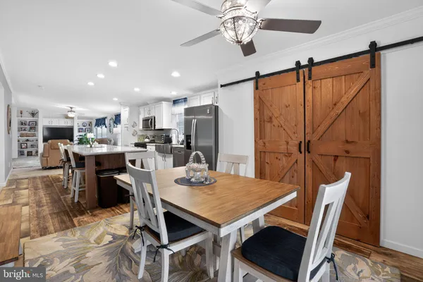 a view of a dining room with furniture