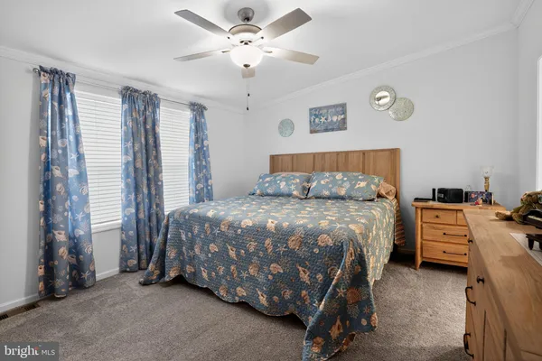 a bedroom with a bed and a closet