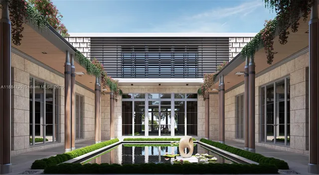 a couple of flower plants in front of house