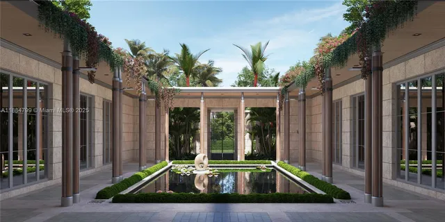 a front view of a house with a yard table and chairs