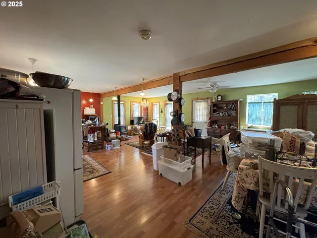 a living room with lots of furniture and a view of living room