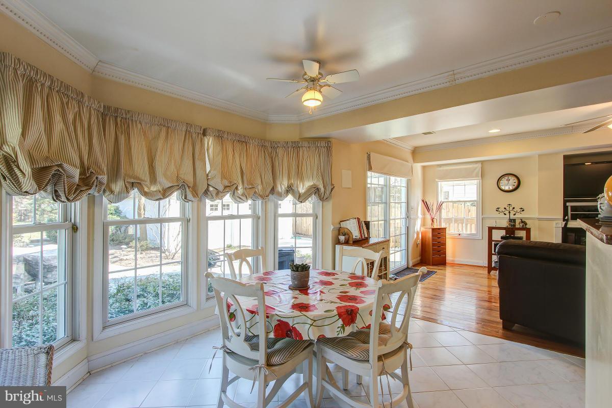 701 Ritchie Avenue Silver Spring, MD 20910 - Photo 10 of 30 Breakfast area w/ woodstove