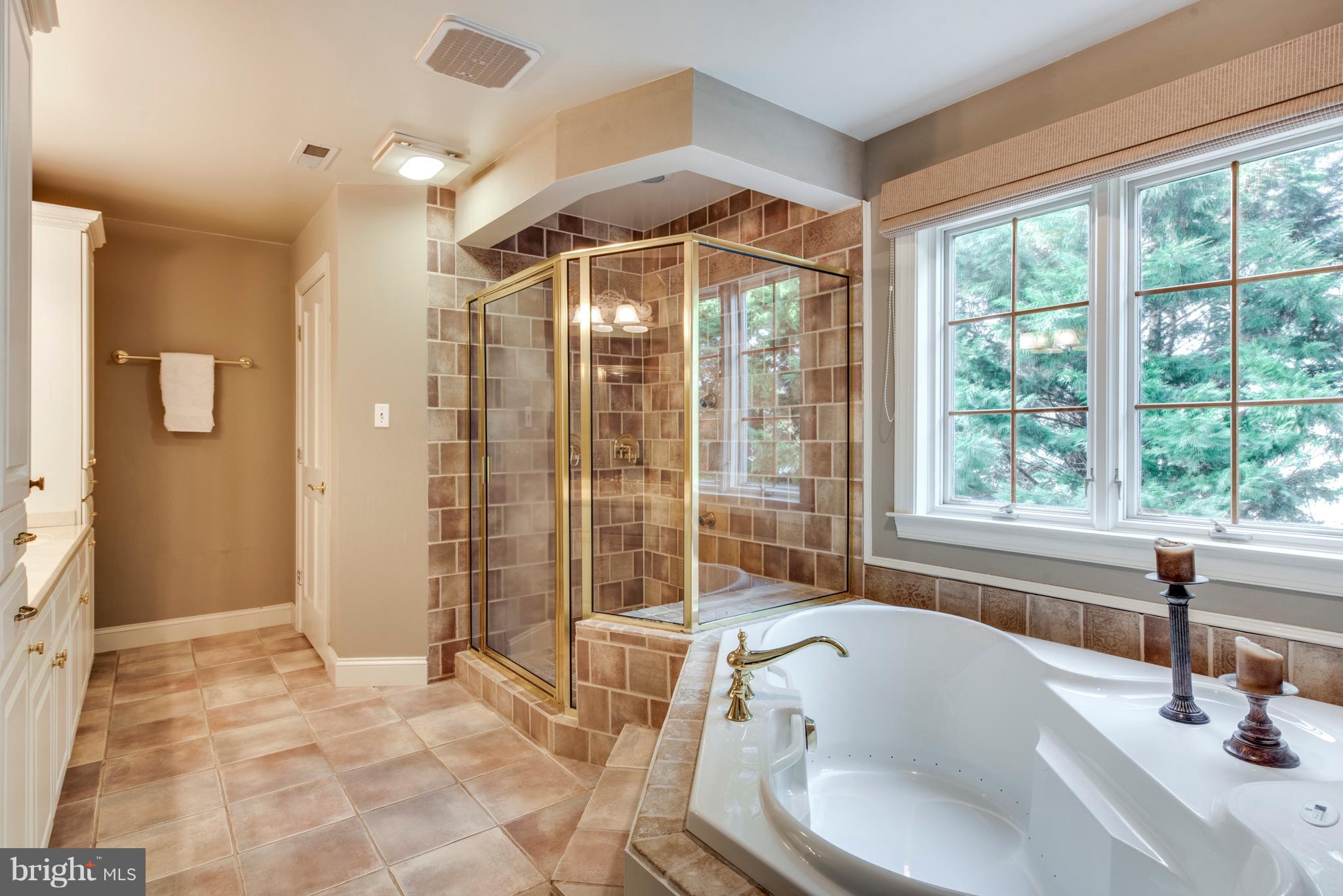 1795 Beachfield Road Annapolis, MD 21409 - Photo 41 of 49 a bathroom with a tub and sink