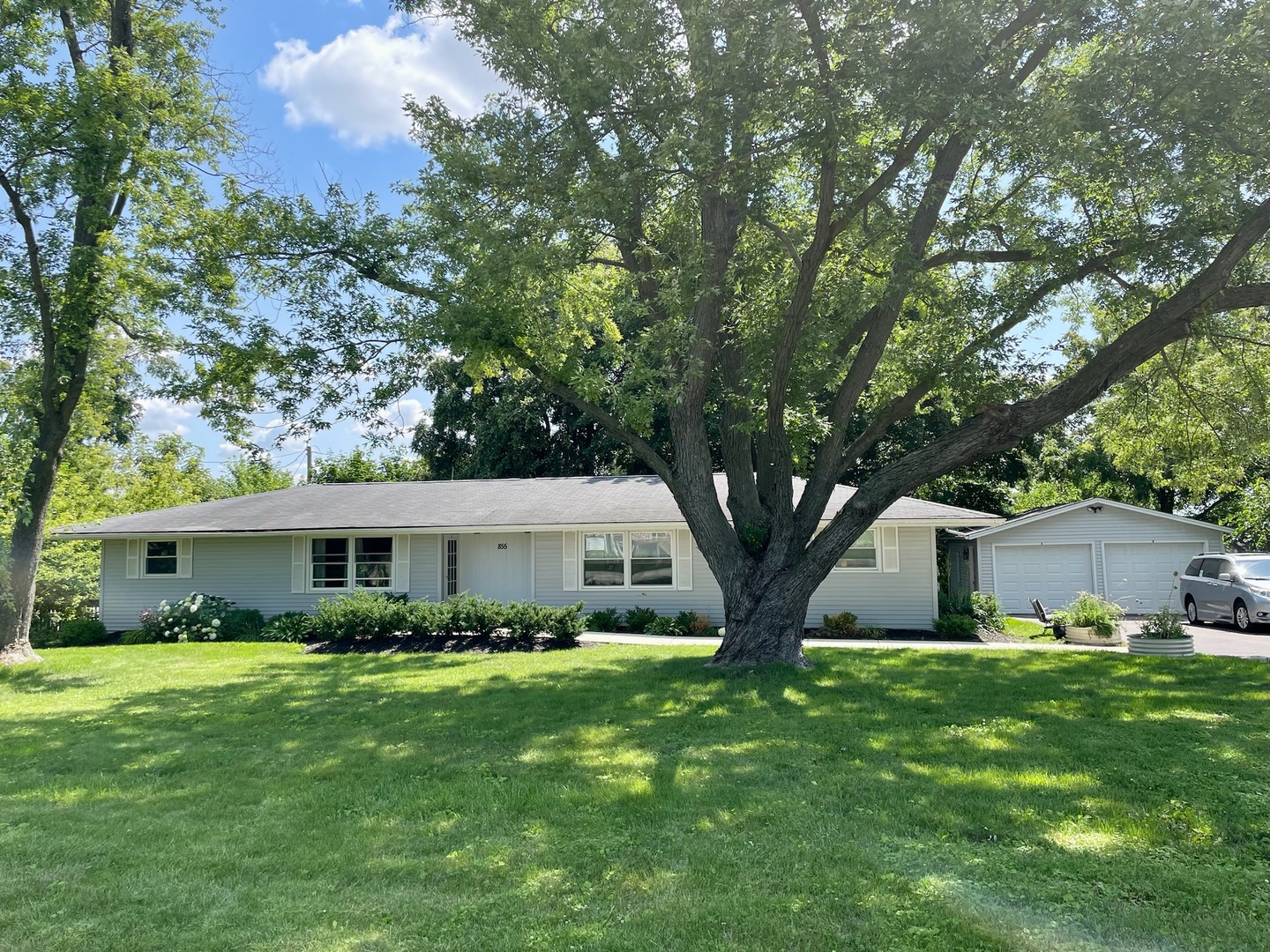 855 Munhall Avenue St. Charles, IL 60174 - Photo 1 of 22 a front view of house with yard and green space