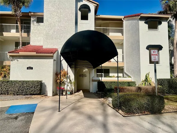 a front view of a house with parking