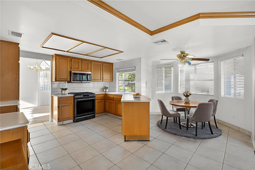 6727 Hawkley Drive Riverside, CA 92506 - Photo 13 of 52 Virtually staged kitchen.