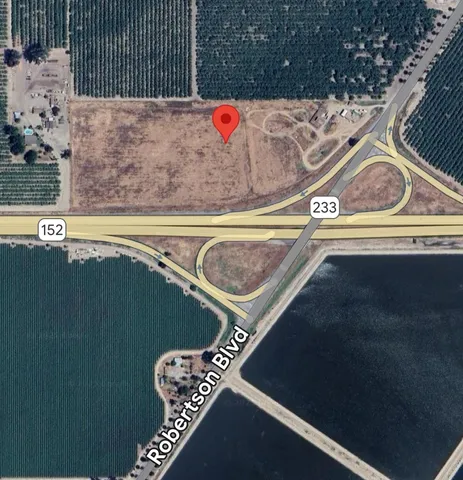 a view of swimming pool and brick wall