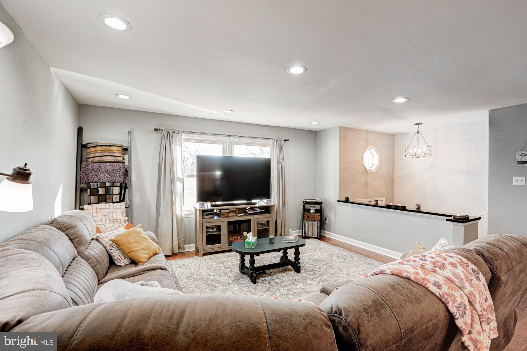 15 Evergreen Drive Newark, DE 19702 - Photo 13 of 85 a living room with furniture and a flat screen tv