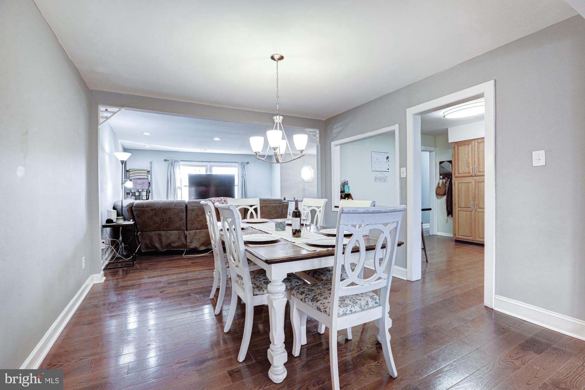 15 Evergreen Drive Newark, DE 19702 - Photo 20 of 85 a view of a dining room with furniture and wooden floor