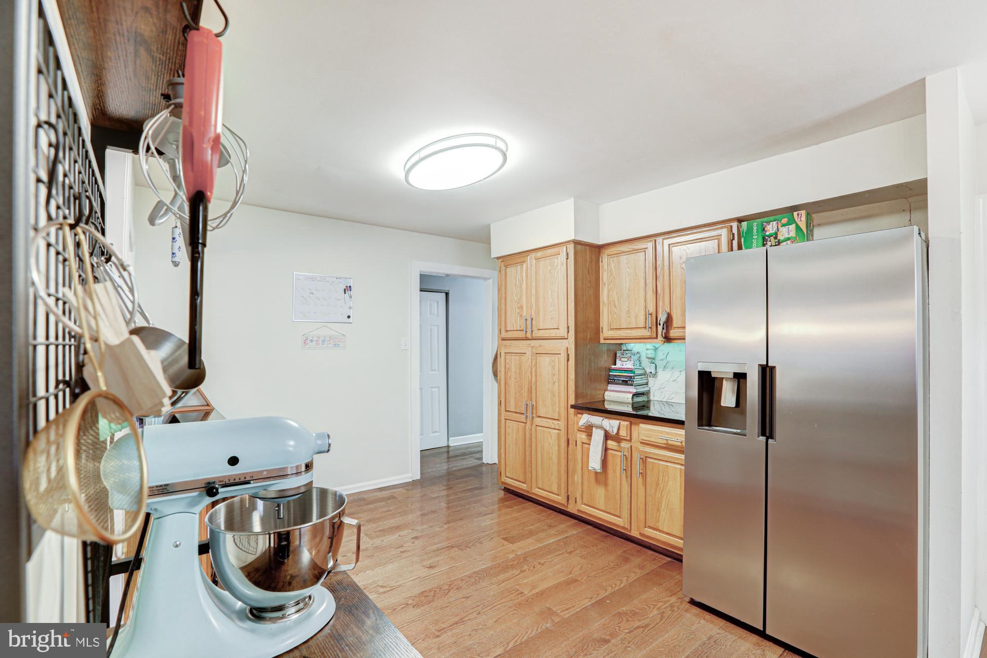 15 Evergreen Drive Newark, DE 19702 - Photo 29 of 85 a kitchen with stainless steel appliances granite countertop a refrigerator and a stove