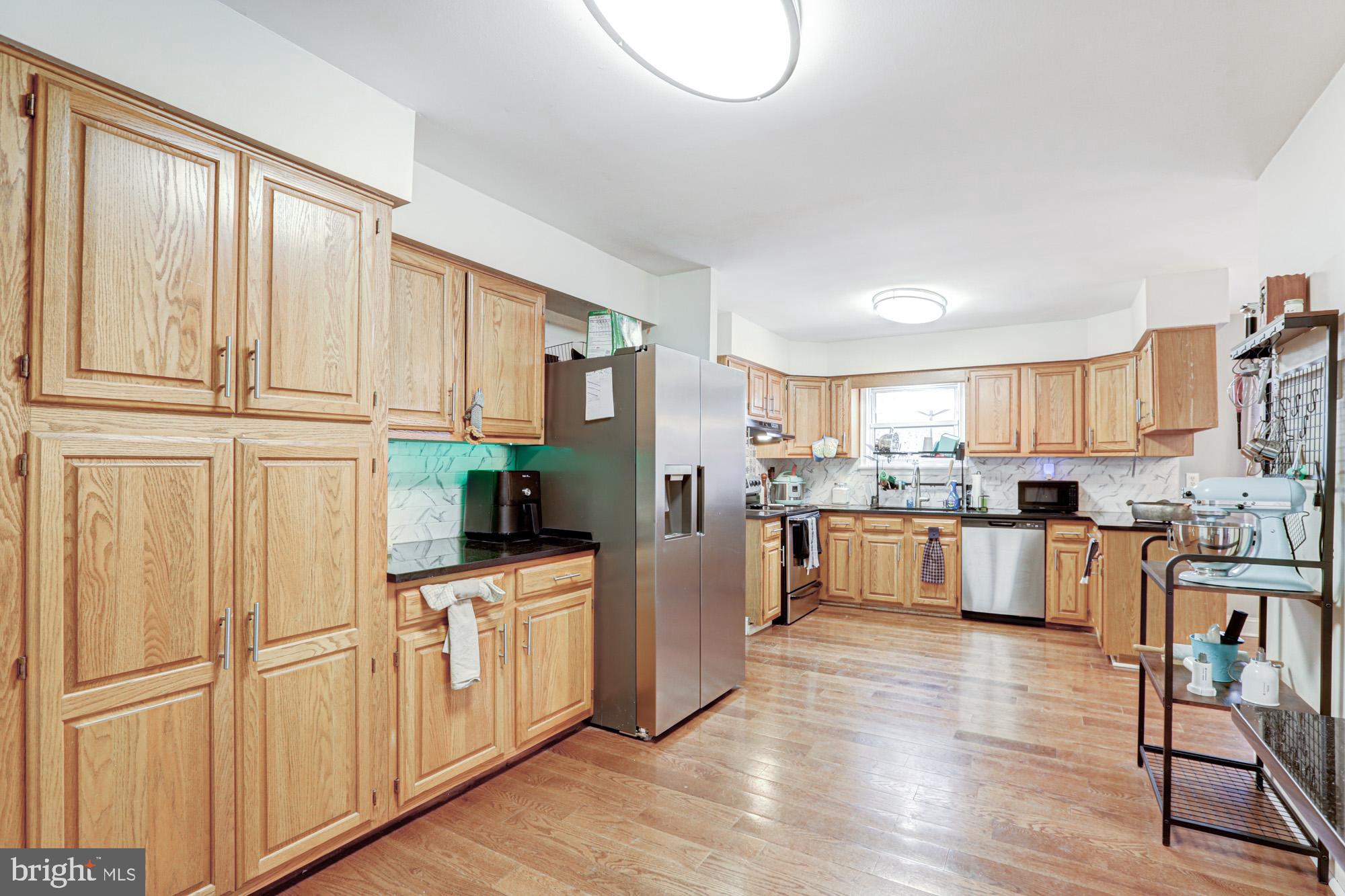 15 Evergreen Drive Newark, DE 19702 - Photo 30 of 85 a kitchen with white cabinets and white appliances