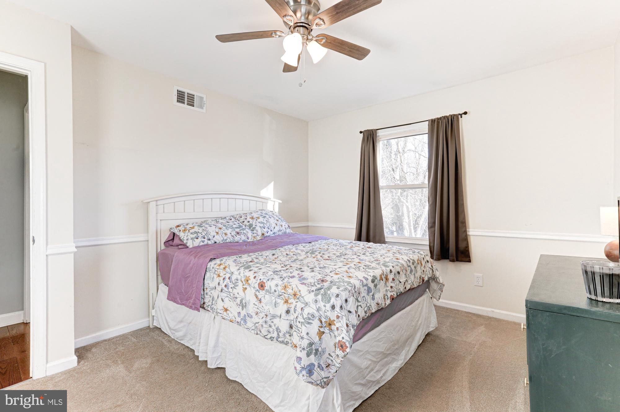 15 Evergreen Drive Newark, DE 19702 - Photo 41 of 85 a bedroom with a bed and window