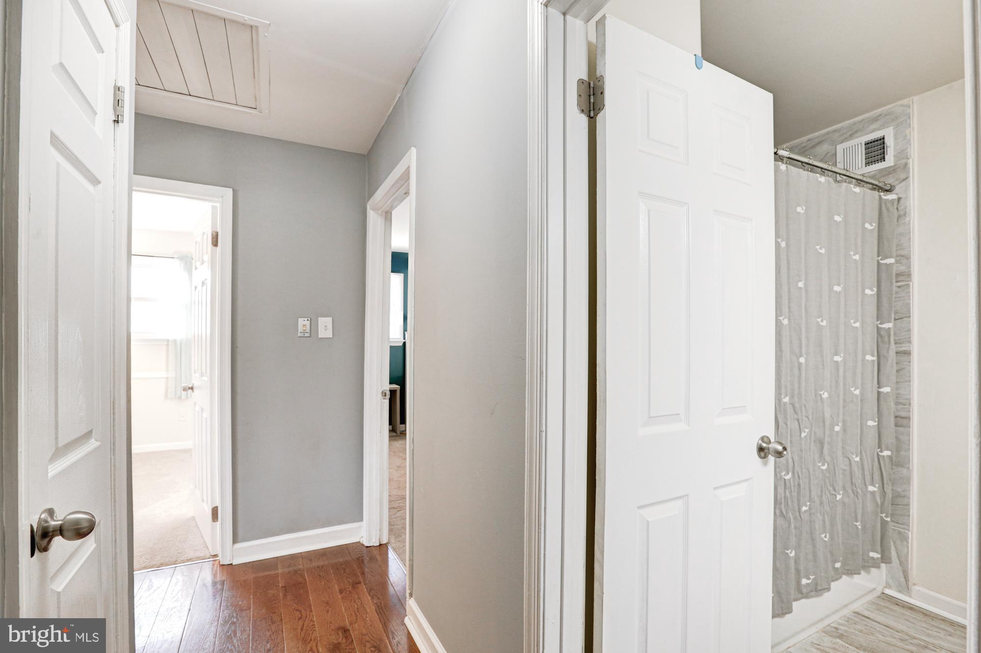 15 Evergreen Drive Newark, DE 19702 - Photo 46 of 85 a view of a bathroom with a shower and a door