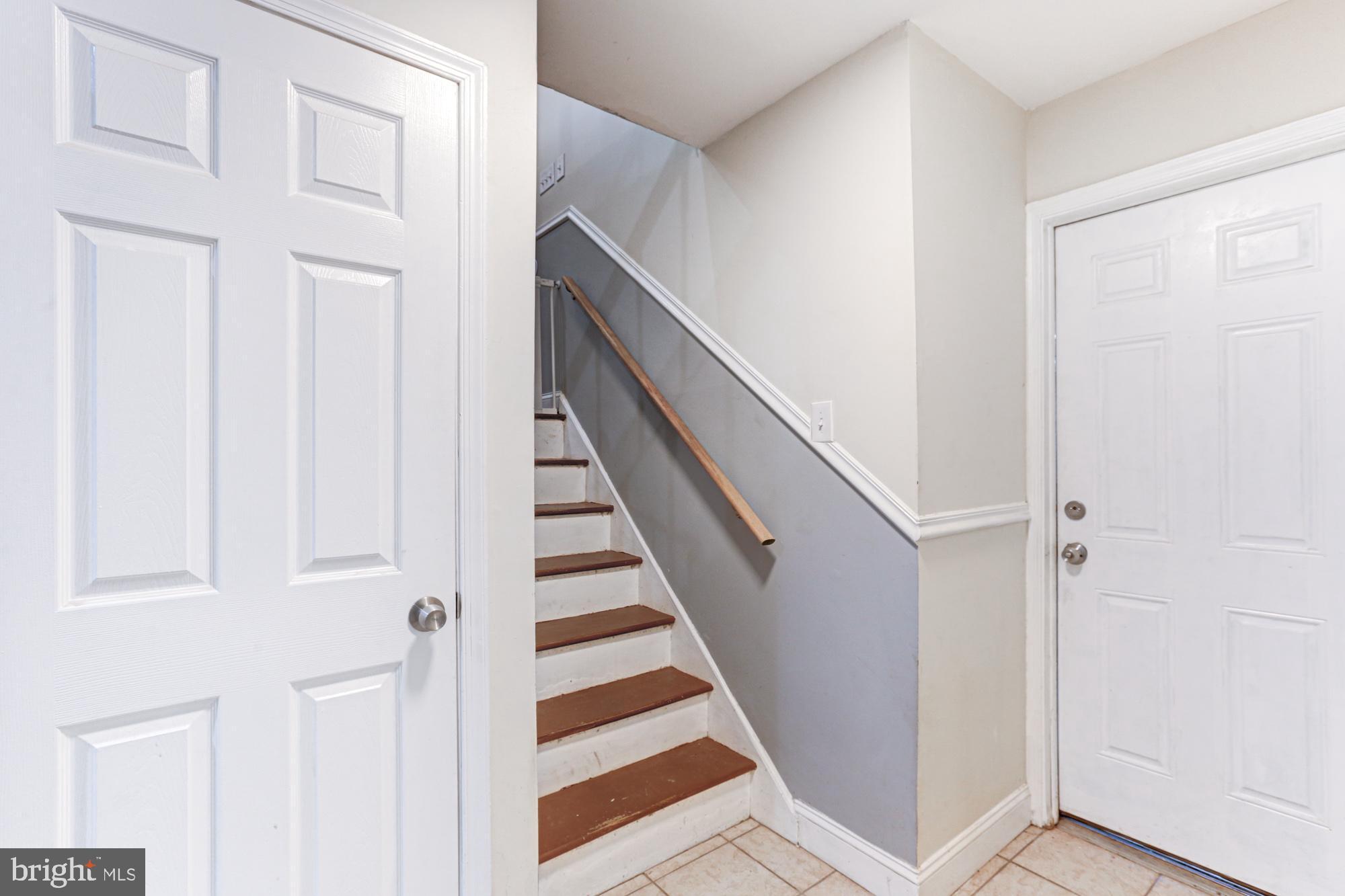 15 Evergreen Drive Newark, DE 19702 - Photo 49 of 85 a view of a hallway with entryway wooden floor and front door