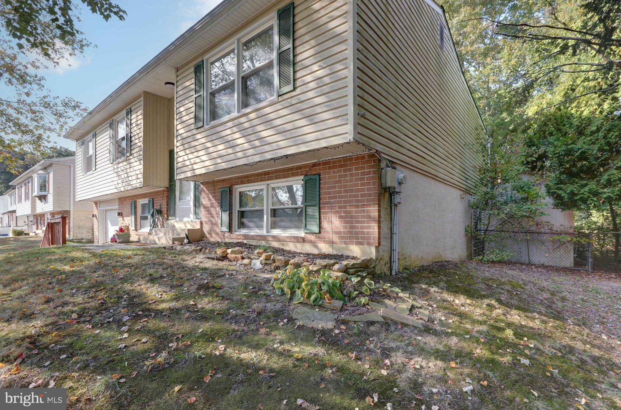 15 Evergreen Drive Newark, DE 19702 - Photo 6 of 85 a front view of a house with garden