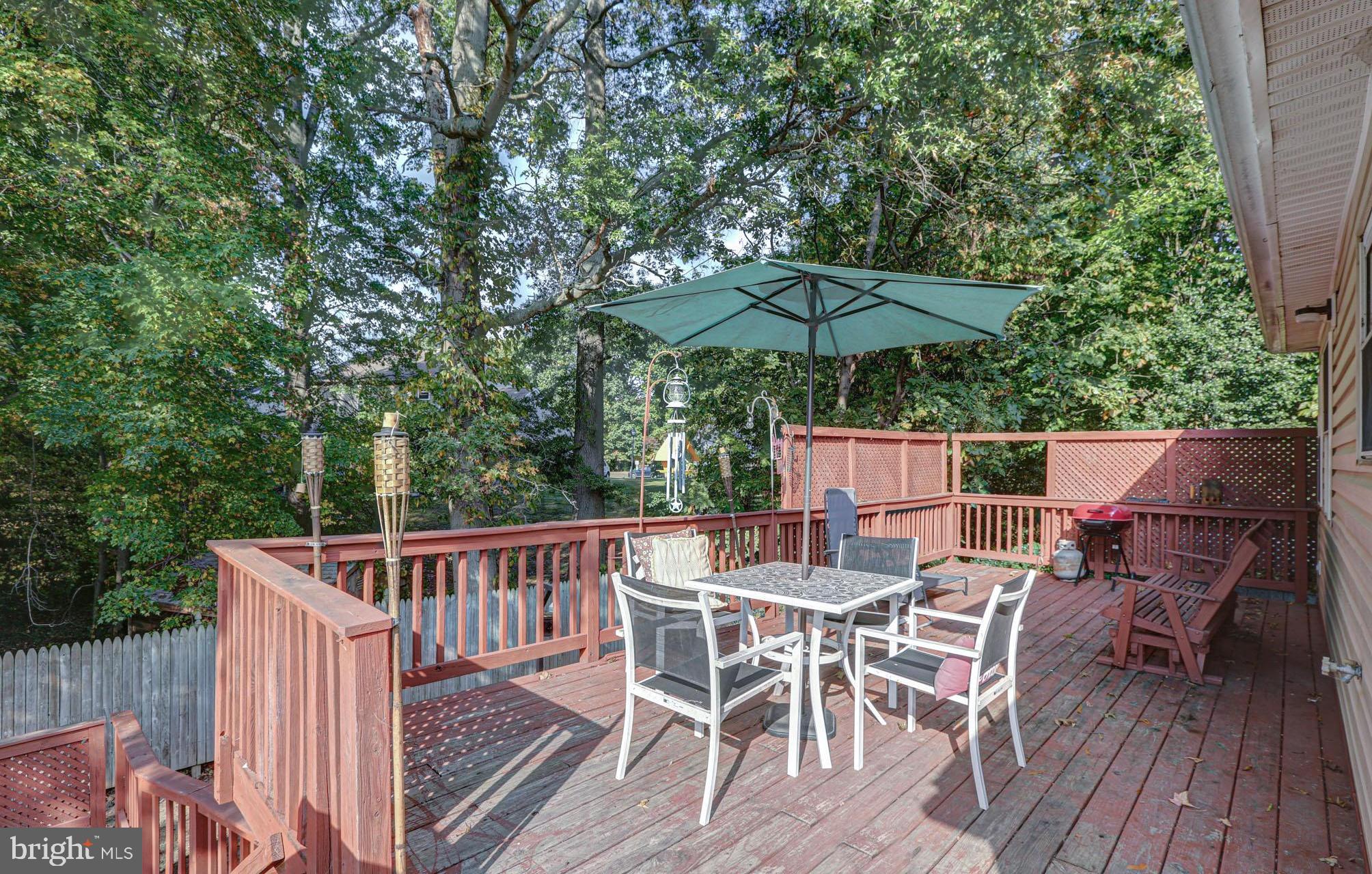 15 Evergreen Drive Newark, DE 19702 - Photo 65 of 85 a view of a chairs and table on the wooden roof deck
