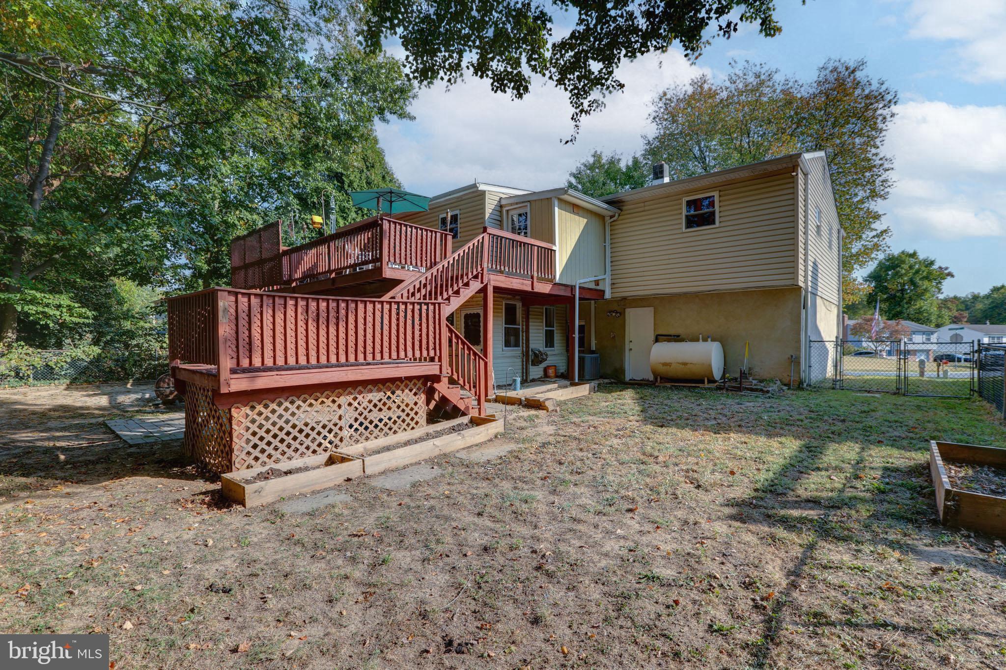 15 Evergreen Drive Newark, DE 19702 - Photo 76 of 85 a view of a house with a yard and sitting area