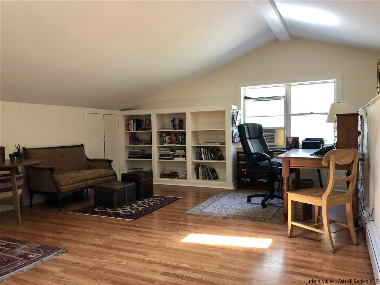 52 Buck Road Stone Ridge, NY 12484 - Photo 12 of 35 a view of a livingroom with furniture and a window