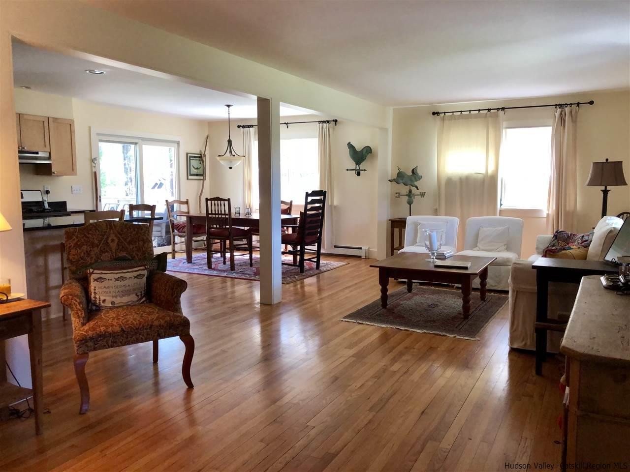 52 Buck Road Stone Ridge, NY 12484 - Photo 4 of 35 a living room with furniture and wooden floor