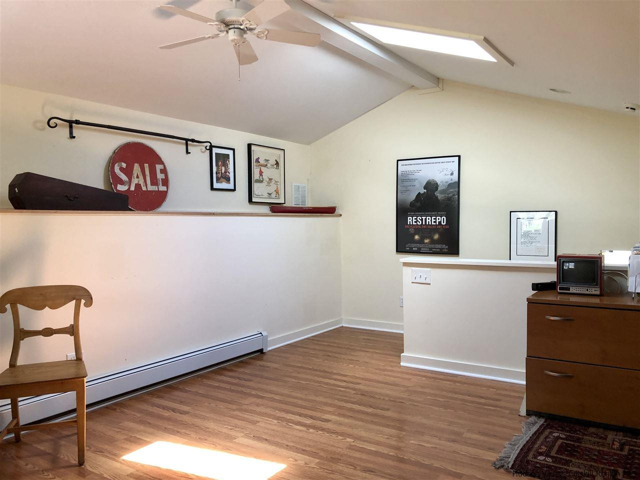 52 Buck Road Stone Ridge, NY 12484 - Photo 10 of 35 a view of a workspace with wooden floor