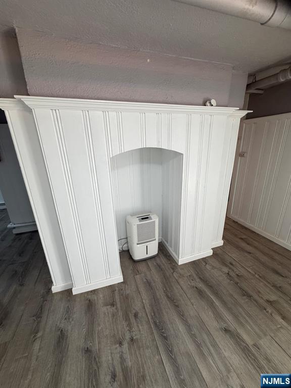 1283 Valley Road, Unit 7 Montclair, NJ 07043 - Photo 21 of 26 a view of a room with wooden floor