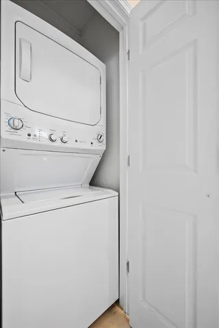 an aerial view of a city with a lake view