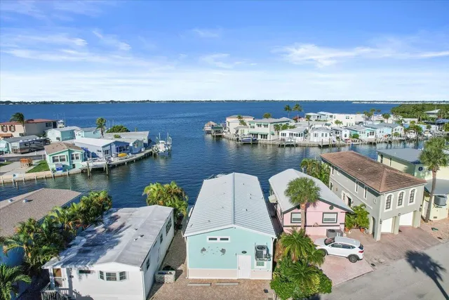 a view of a swimming pool with a lounge chair