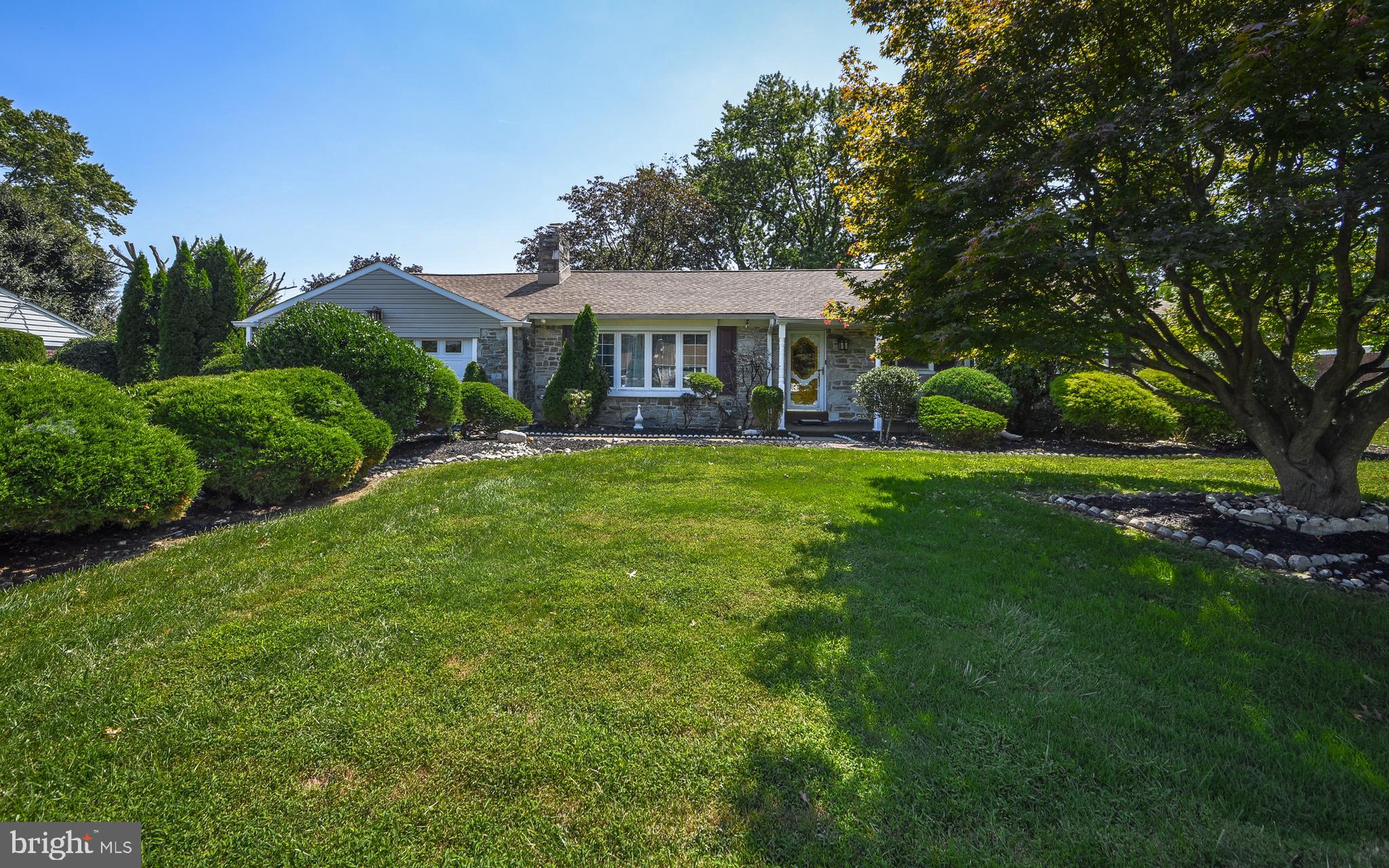 2083 Williamsburg Road Huntingdon Valley, PA 19006 - Photo 2 of 46 a front view of a house with garden