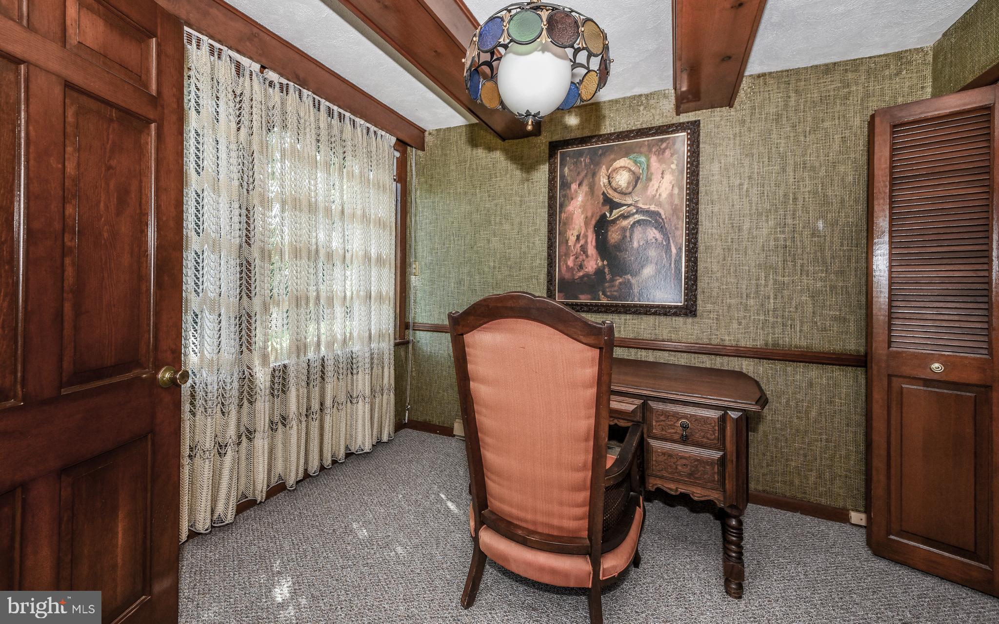 2083 Williamsburg Road Huntingdon Valley, PA 19006 - Photo 15 of 46 a dining room with furniture and paintings on the wall