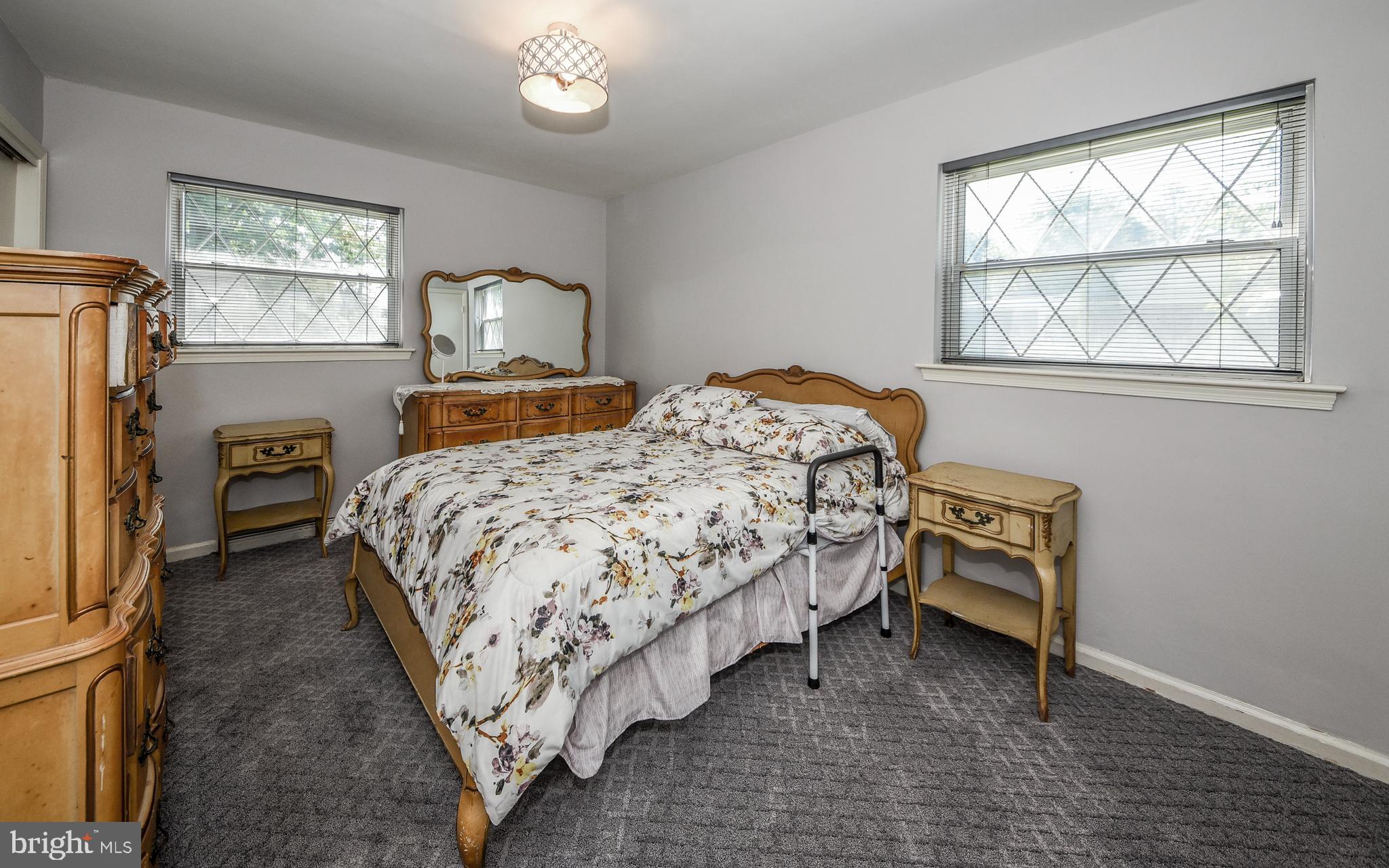 2083 Williamsburg Road Huntingdon Valley, PA 19006 - Photo 20 of 46 a bedroom with a bed chair and window