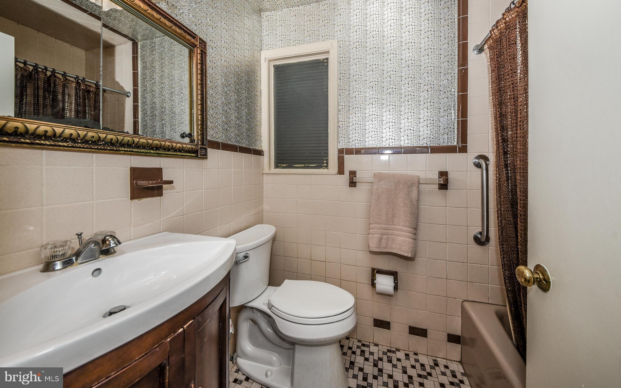 2083 Williamsburg Road Huntingdon Valley, PA 19006 - Photo 25 of 46 a bathroom with a sink a toilet and shower