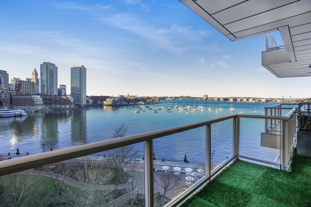 22 Liberty Drive, Unit 7M Boston, MA 02210 - Photo 13 of 31 a view of a lake with a city from a terrace