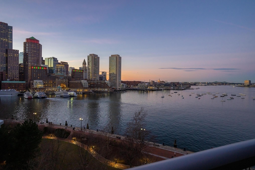 22 Liberty Drive, Unit 7M Boston, MA 02210 - Photo 27 of 31 a view of a lake with tall buildings