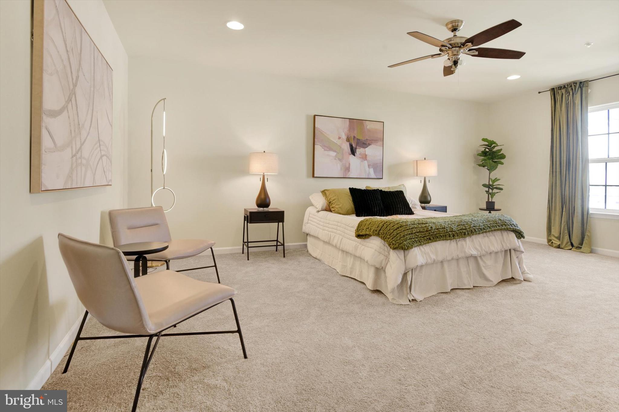 637 Bentgrass Drive Aberdeen, MD 21001 - Photo 12 of 35 a bed room with a bed and a chair