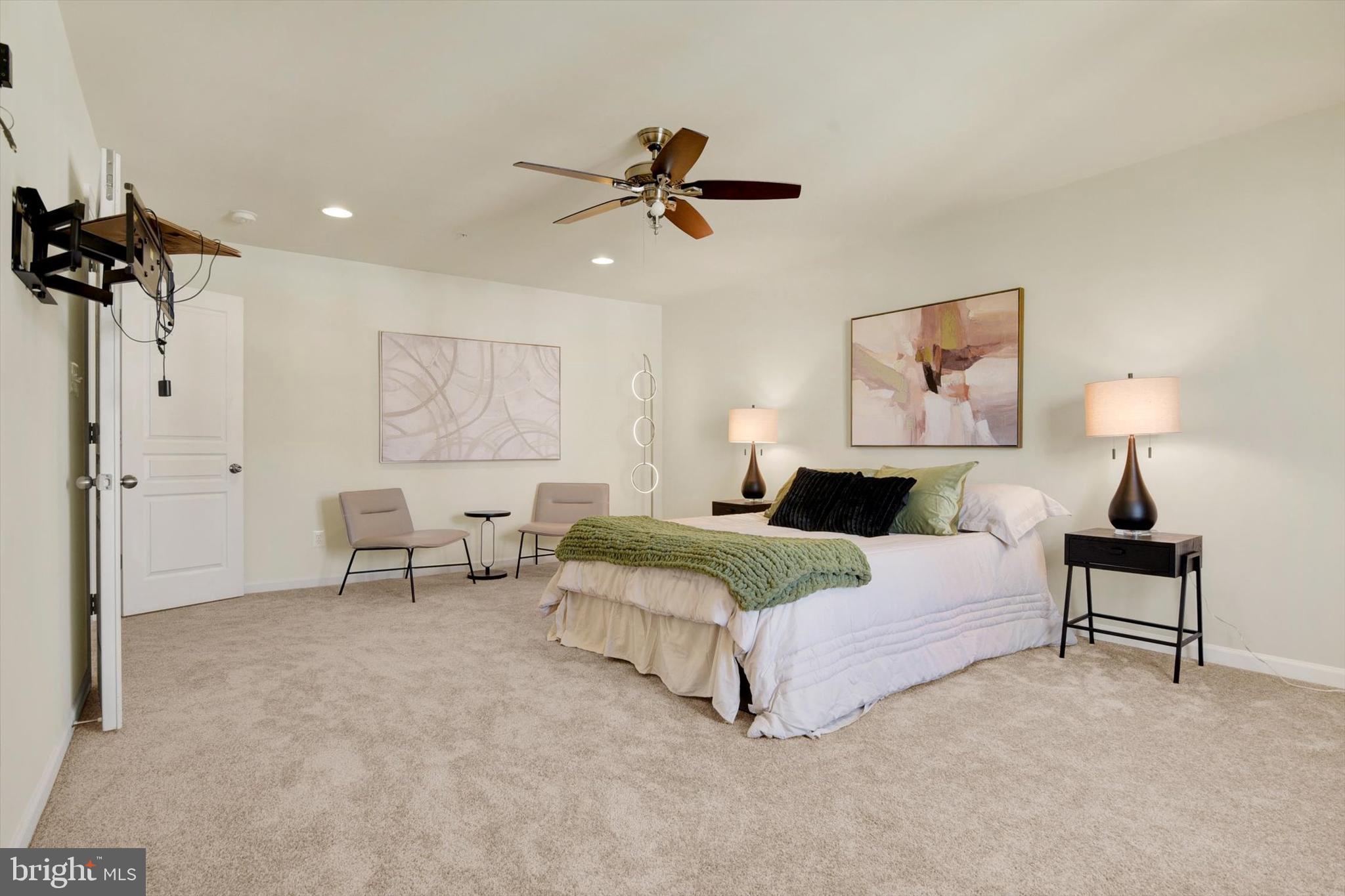 637 Bentgrass Drive Aberdeen, MD 21001 - Photo 13 of 35 a bedroom with a bed and a chandelier